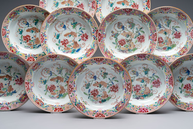 A set of 12 Chinese famille rose plates with squirrels among grapes and peonies, Qianlong