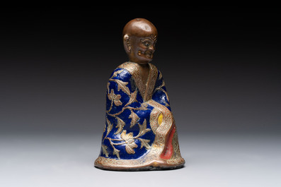 A Chinese champlev&eacute; figure of Luohan, Qianlong mark, 18/19th C.