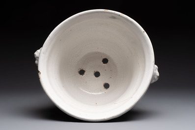 A white French Delftware jardini&egrave;re, dated August 1770
