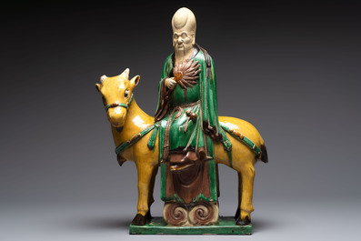 A Chinese sancai-glazed 'Shoulao riding a deer' group, Qing