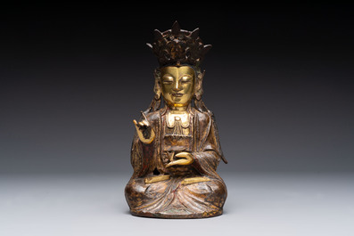 A Chinese parcel-gilt bronze Guanyin, Ming