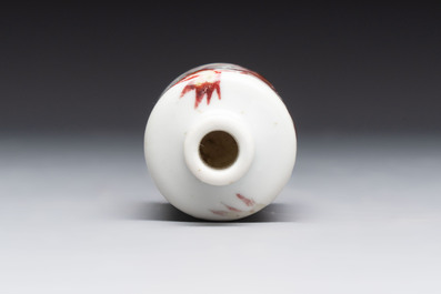 A Chinese copper-red and white 'bamboo' snuff bottle, Qianlong mark, 19th C.