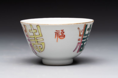 A Chinese blue and white vase, a jar, a famille rose cup and a plaque, signed He Xuren 何許人, 19th C.