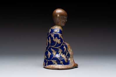 A Chinese champlev&eacute; figure of Luohan, Qianlong mark, 18/19th C.