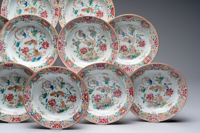A set of 12 Chinese famille rose plates with squirrels among grapes and peonies, Qianlong