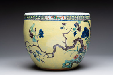 A Chinese famille rose yellow-ground 'pheasant and peony' scroll pot, 19th C.