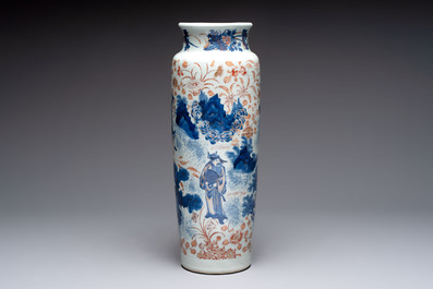 A Chinese gilt and iron-red decorated blue and white rouleau vase with figural design, 19/20th C.