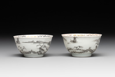 A pair of Chinese grisaille and iron-red 'landscape' cups and saucers, Yongzheng/Qianlong
