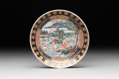 A fine Chinese famille rose 'apple pickers' cup and saucer, Yongzheng