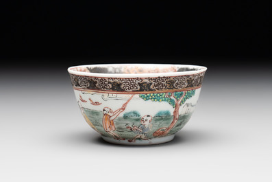 A fine Chinese famille rose 'apple pickers' cup and saucer, Yongzheng