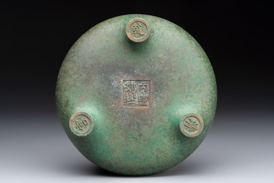 A Chinese bronze tripod censer, Nei Tan Jiao She 内坛郊社 and Qing Qian Gong 清乾宫 mark, 18/19th C.