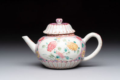 A Chinese famille rose moulded teapot and stand with floral design, Yongzheng/Qianlong