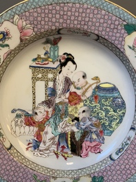 An extremely fine pair of Chinese famille rose ruby-back eggshell plates with a lady and playing boys, Yongzheng