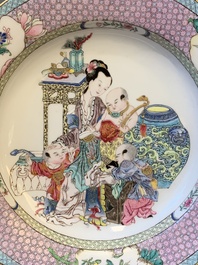 An extremely fine pair of Chinese famille rose ruby-back eggshell plates with a lady and playing boys, Yongzheng