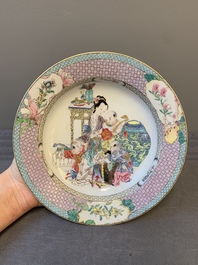 An extremely fine pair of Chinese famille rose ruby-back eggshell plates with a lady and playing boys, Yongzheng