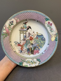 An extremely fine pair of Chinese famille rose ruby-back eggshell plates with a lady and playing boys, Yongzheng