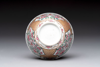 A fine Chinese gilt-decorated famille rose 'flower basket' cup and saucer, Yongzheng