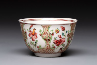 A fine Chinese gilt-decorated famille rose cup and saucer with floral design, Yongzheng