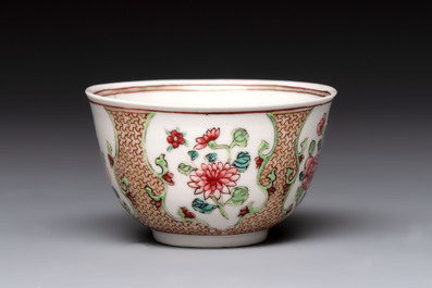A fine Chinese gilt-decorated famille rose cup and saucer with floral design, Yongzheng
