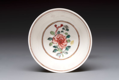 A fine Chinese gilt-decorated famille rose cup and saucer with floral design, Yongzheng