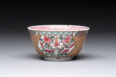 A fine Chinese gilt-decorated famille rose 'flower basket' cup and saucer, Yongzheng