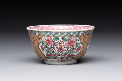 A fine Chinese gilt-decorated famille rose 'flower basket' cup and saucer, Yongzheng