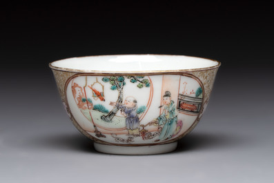 A Chinese Canton famille rose 'mandarin subject' cup and saucer, Qianlong