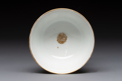 A Chinese Canton famille rose 'mandarin subject' cup and saucer, Qianlong