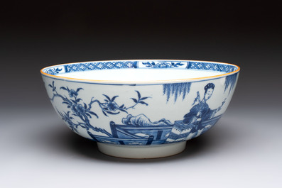 A Chinese blue and white punch bowl with a lady and two boys in a garden, Qianlong