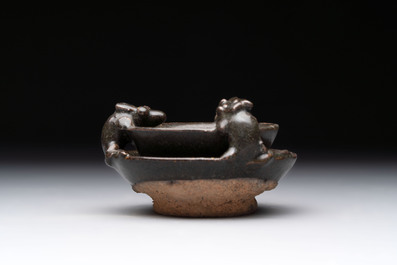 A rare Chinese black-glazed two-tier oil lamp with three rats, Ming