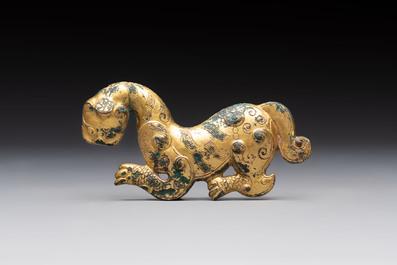 A rare Chinese gilt-bronze 'tiger' ornament, Han