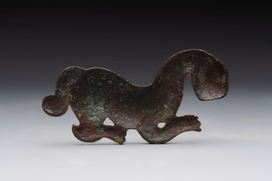 A rare Chinese gilt-bronze 'tiger' ornament, Han
