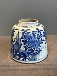 A Chinese blue and white bell-shaped water pot with birds among flowering branches, Kangxi