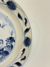 A Chinese blue and white 'Sense of Smell' plate and an 'Amorous Shepherds' plate, Kangxi