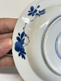A Chinese blue and white 'Sense of Smell' plate and an 'Amorous Shepherds' plate, Kangxi