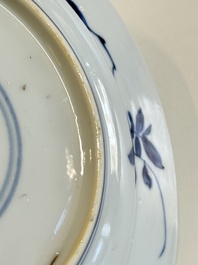 A Chinese blue and white 'Sense of Smell' plate and an 'Amorous Shepherds' plate, Kangxi