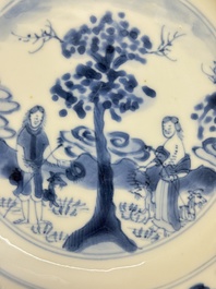 A Chinese blue and white 'Sense of Smell' plate and an 'Amorous Shepherds' plate, Kangxi