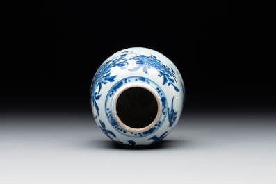 A Chinese blue and white bell-shaped water pot with birds among flowering branches, Kangxi
