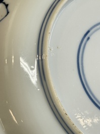 A Chinese blue and white 'Sense of Smell' plate and an 'Amorous Shepherds' plate, Kangxi