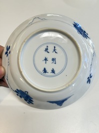 A Chinese blue and white 'Sense of Smell' plate and an 'Amorous Shepherds' plate, Kangxi