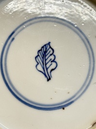 A Chinese blue and white 'Sense of Smell' plate and an 'Amorous Shepherds' plate, Kangxi