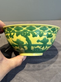 An imperial Chinese green-enamelled yellow-ground 'playing boys' bowl, Yongzheng mark and of the period