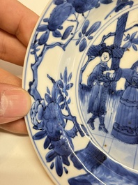 A Chinese blue and white 'Sense of Smell' plate and an 'Amorous Shepherds' plate, Kangxi