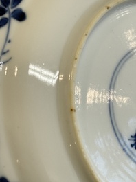 A Chinese blue and white 'Sense of Smell' plate and an 'Amorous Shepherds' plate, Kangxi