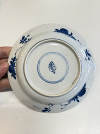 A Chinese blue and white 'Sense of Smell' plate and an 'Amorous Shepherds' plate, Kangxi
