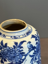 A Chinese blue and white bell-shaped water pot with birds among flowering branches, Kangxi