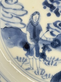 A Chinese blue and white 'Sense of Smell' plate and an 'Amorous Shepherds' plate, Kangxi