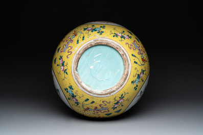 A large Chinese famille rose yellow-ground 'tianqiu ping' vase with flowers and antiquities, 19th C.