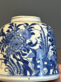 A Chinese blue and white bell-shaped water pot with birds among flowering branches, Kangxi