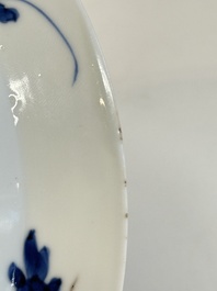 A Chinese blue and white 'Sense of Smell' plate and an 'Amorous Shepherds' plate, Kangxi